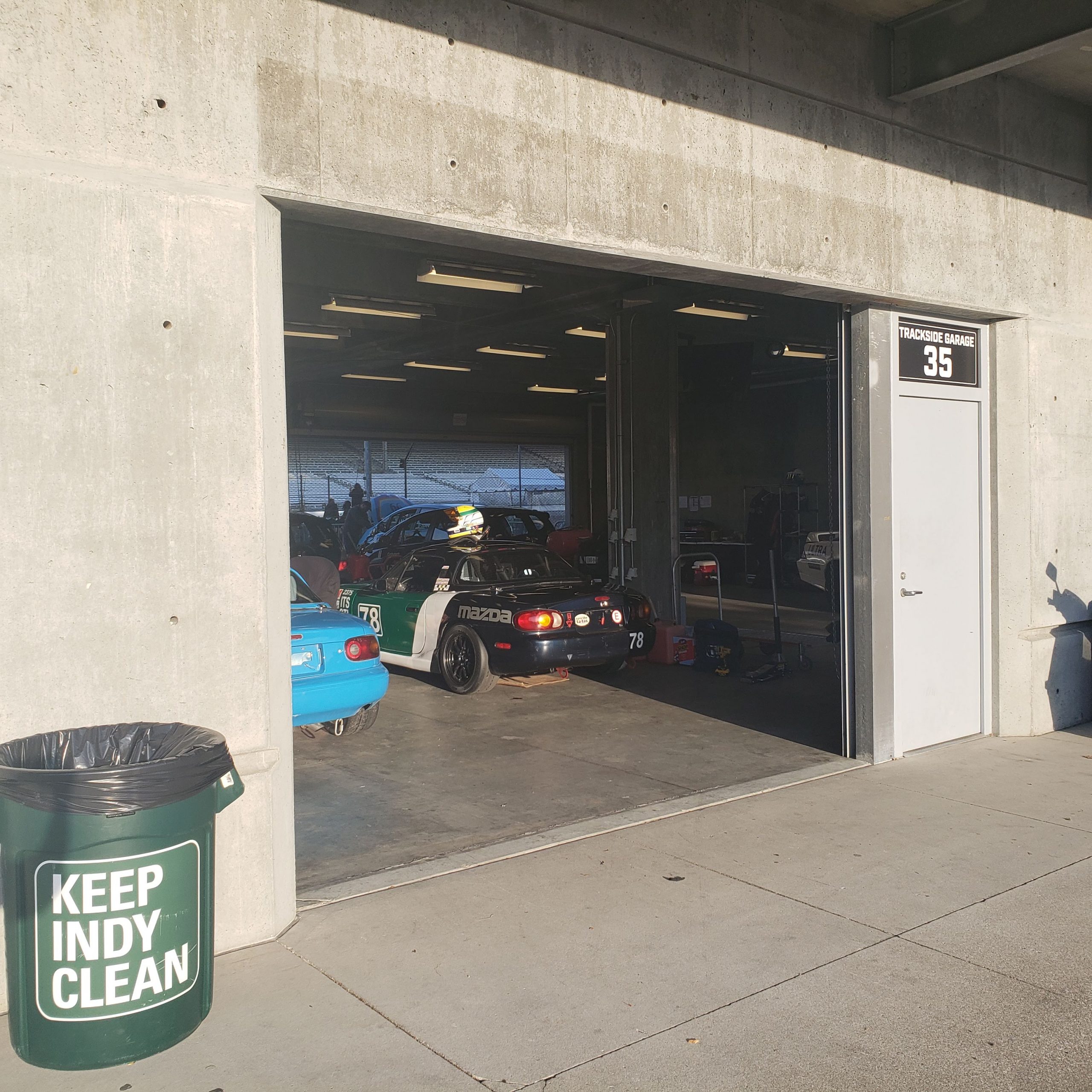 Spec Miata racecars at Indy garage