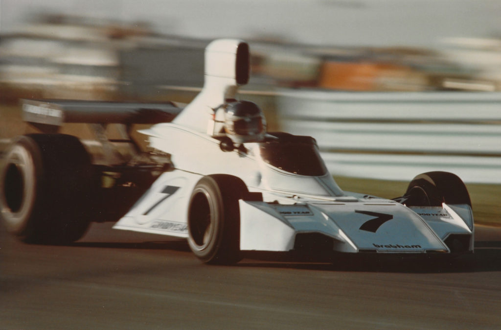 Brabham number 7 Phil Reilly driving action